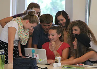 Teenagers collaborating in Middle School Studio